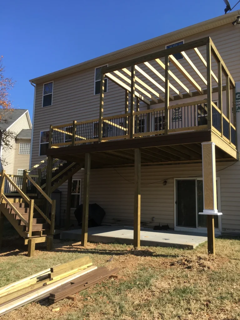During: framing the new two-level deck and screened porch roof