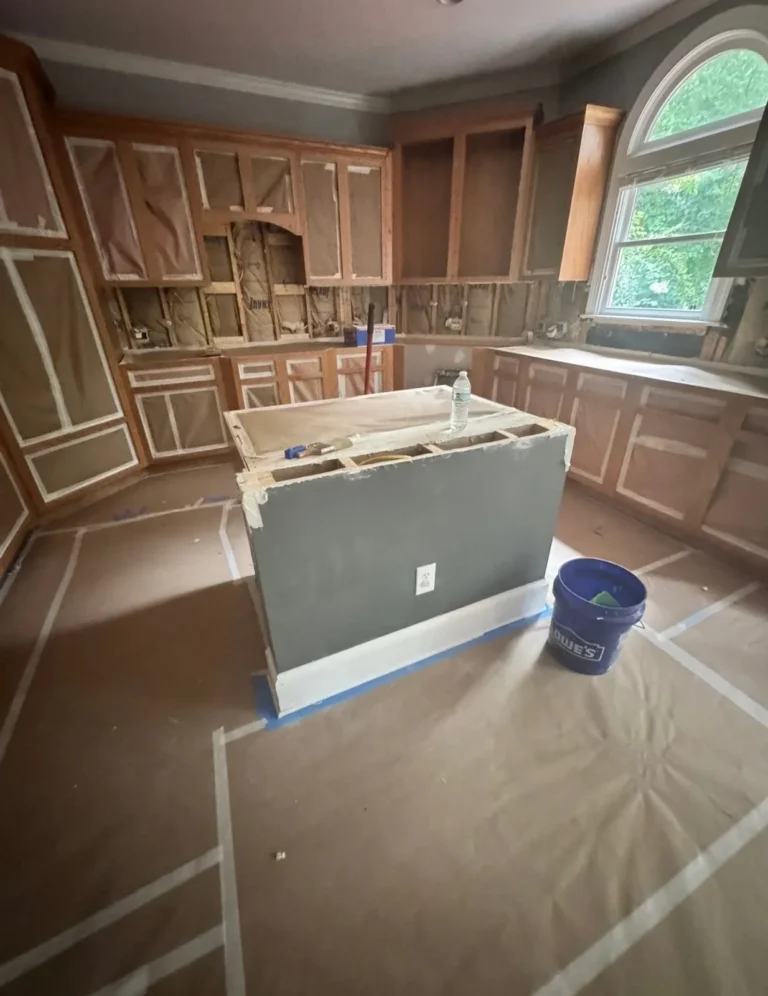 During: cabinets prepped and masked for painting