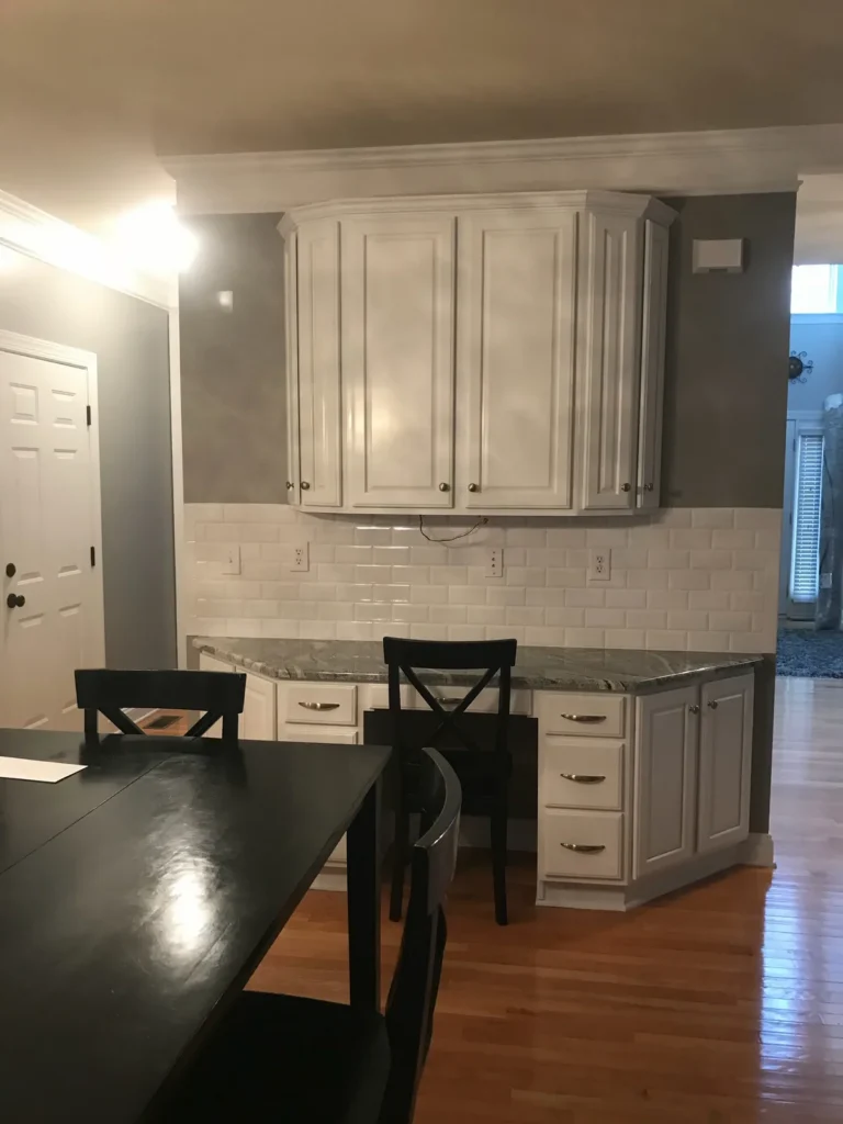 After: white painted desk area with granite top